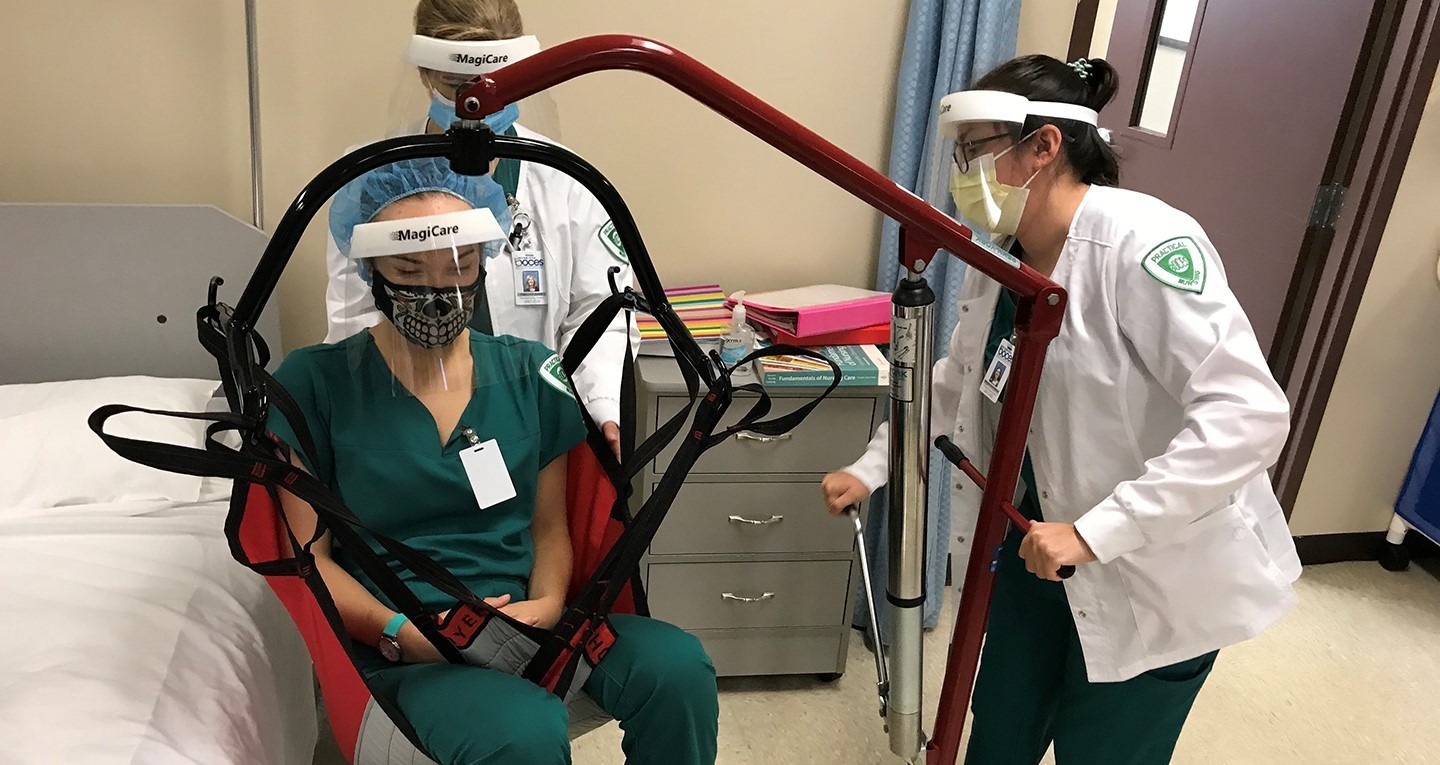 future nurses learn to use specialized equipment