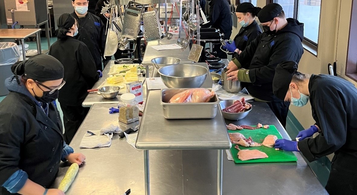 Students learning to cook