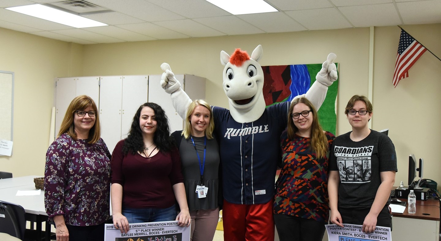 Students and teacher posing with Rumble Pony